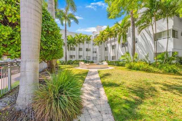 1300 Pennsylvania Ave Unit 104, Miami Beach, FL 33139 - surrounding community with a yard and fence