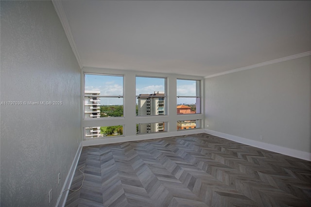 700 Biltmore Way Unit 1016, Coral Gables, FL 33134 - spare room with baseboards and ornamental molding