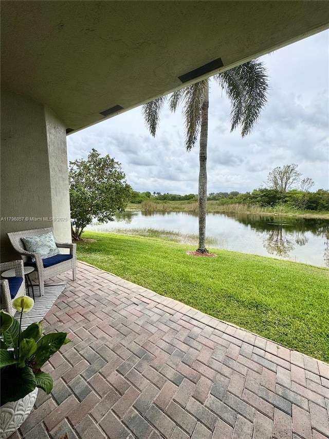 16724 NW 8th St, Pembroke Pines, FL 33028 - view of patio with a water view