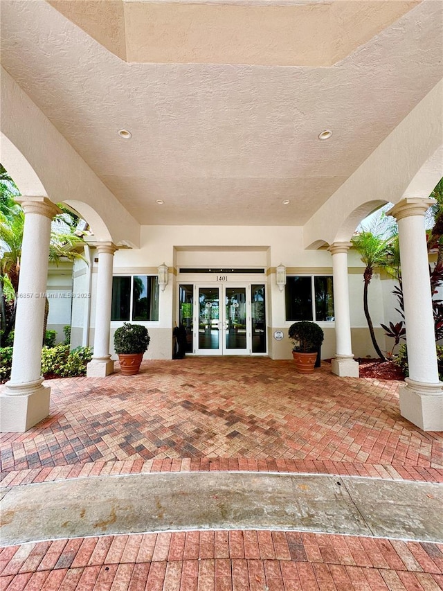 16724 NW 8th St, Pembroke Pines, FL 33028 - view of patio / terrace featuring french doors