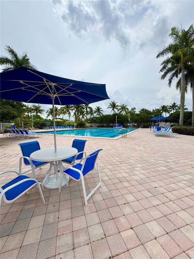 16724 NW 8th St, Pembroke Pines, FL 33028 - community pool featuring a patio