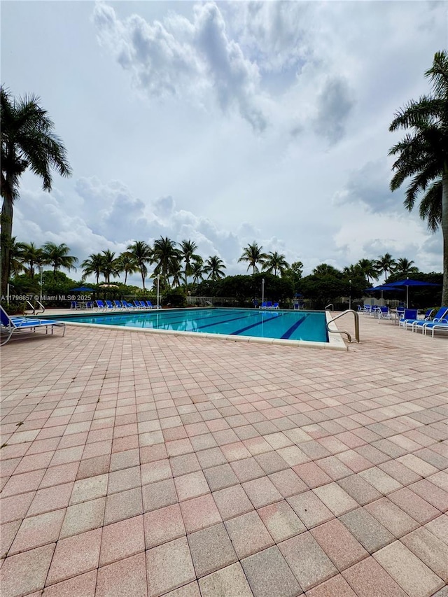 16724 NW 8th St, Pembroke Pines, FL 33028 - community pool featuring a patio