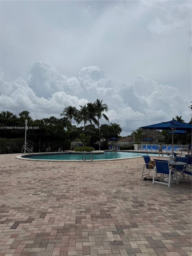 16724 NW 8th St, Pembroke Pines, FL 33028 - pool featuring a patio and fence