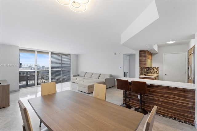 dining room with expansive windows