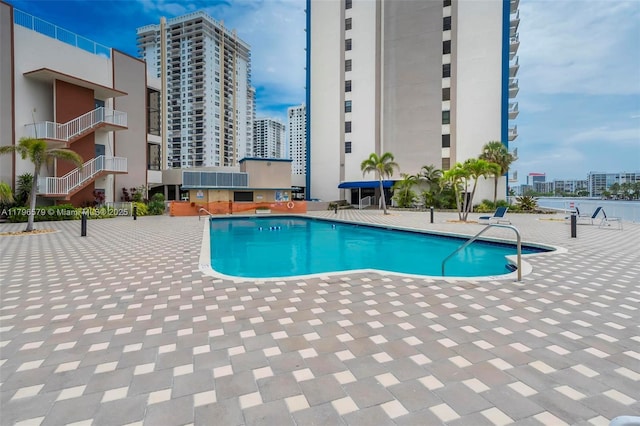 pool with a patio