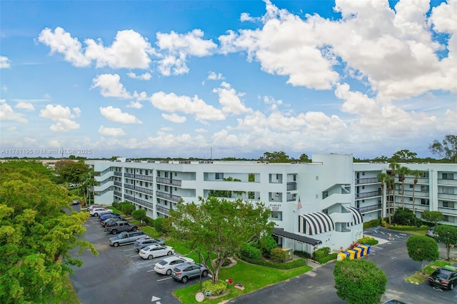 6698 N 10th Ave N Unit 218, Lake Worth, FL 33467 - view of building exterior with uncovered parking