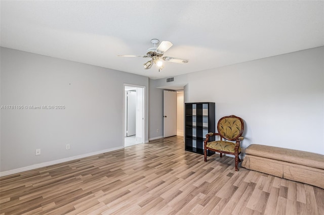 6698 N 10th Ave N Unit 218, Lake Worth, FL 33467 - unfurnished room with baseboards, ceiling fan, visible vents, and light wood-type flooring