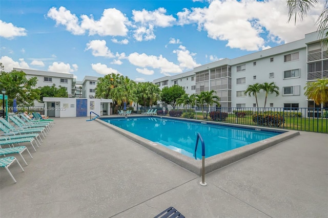 6698 N 10th Ave N Unit 218, Lake Worth, FL 33467 - community pool with a patio and fence