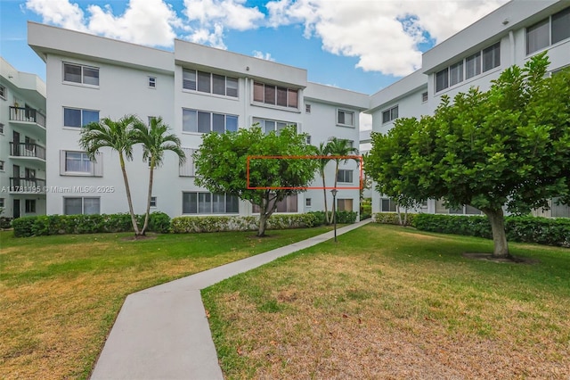 6698 N 10th Ave N Unit 218, Lake Worth, FL 33467 - surrounding community with a yard