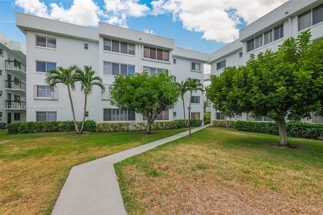 6698 N 10th Ave N Unit 218, Lake Worth, FL 33467 - view of property's community featuring a yard