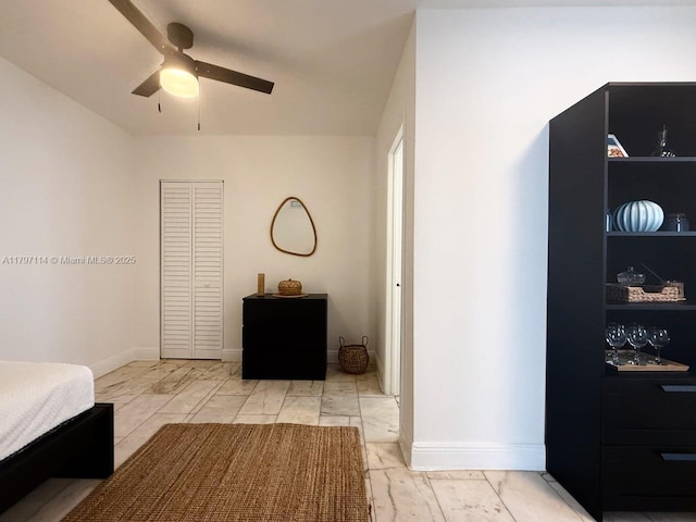 1526 Pennsylvania Ave Unit 20, Miami Beach, FL 33139 - bedroom featuring ceiling fan, baseboards, and marble finish floor