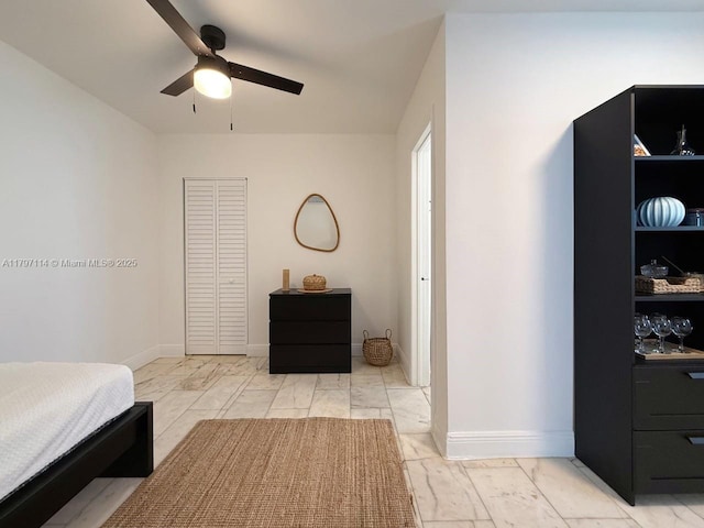 1526 Pennsylvania Ave Unit 20, Miami Beach, FL 33139 - bedroom with marble finish floor, baseboards, and ceiling fan