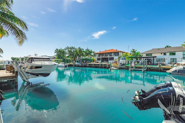 2020 NE 121st Rd, North Miami, FL 33181 - view of pool with a boat dock and boat lift