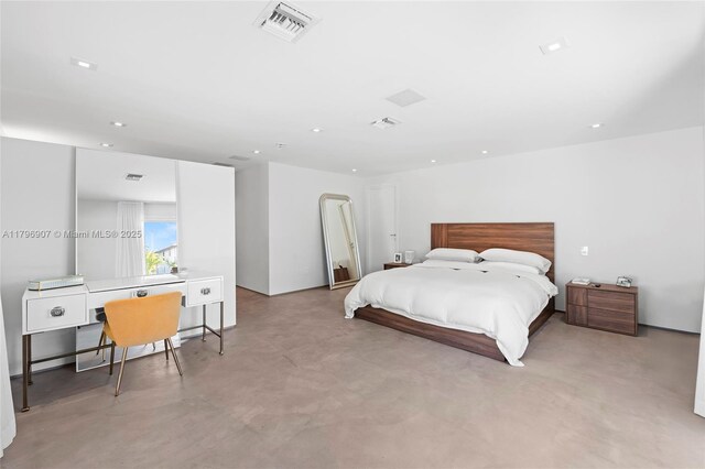 2020 NE 121st Rd, North Miami, FL 33181 - bedroom with concrete floors, recessed lighting, and visible vents