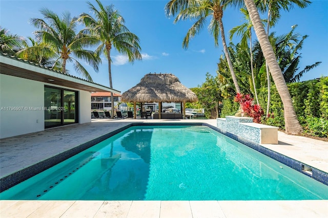 2020 NE 121st Rd, North Miami, FL 33181 - outdoor pool featuring a gazebo, a patio area, and french doors