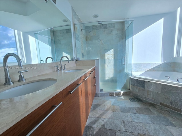 2641 N Flamingo Rd Unit 2601N, Sunrise, FL 33323 - full bath featuring a bath, stone tile floors, a sink, and double vanity