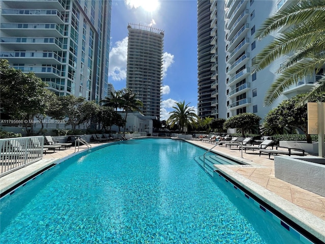 community pool featuring a patio
