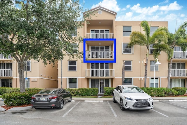 519 E Sheridan St Unit 3052, Dania Beach, FL 33004 - view of property featuring uncovered parking