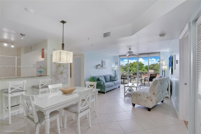519 E Sheridan St Unit 3052, Dania Beach, FL 33004 - dining area featuring light tile patterned floors, a ceiling fan, and visible vents