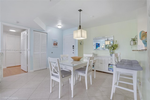 519 E Sheridan St Unit 3052, Dania Beach, FL 33004 - dining area with light tile patterned floors and baseboards