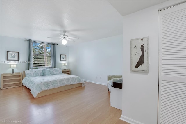 519 E Sheridan St Unit 3052, Dania Beach, FL 33004 - bedroom featuring light wood finished floors, baseboards, a closet, and a ceiling fan