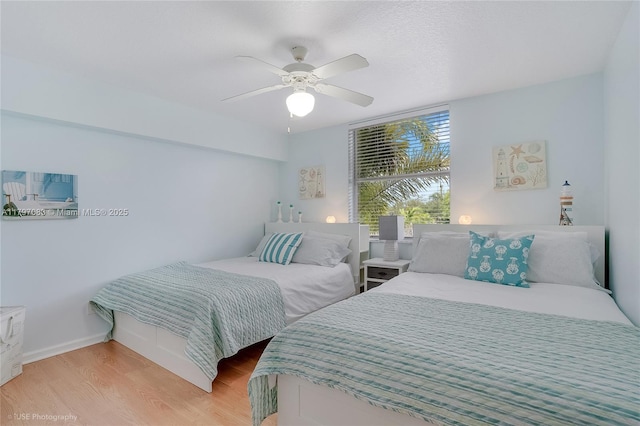 519 E Sheridan St Unit 3052, Dania Beach, FL 33004 - bedroom with light wood-style flooring and ceiling fan