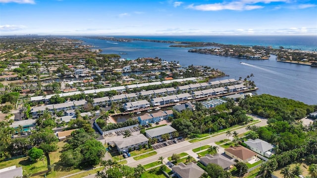 bird's eye view with a water view and a residential view