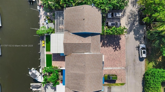 bird's eye view with a water view