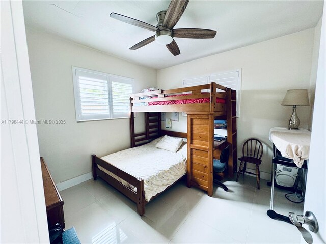 1245 SW 85th Ave, Miami, FL 33144 - bedroom with ceiling fan and baseboards