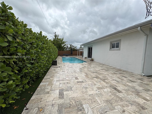 1245 SW 85th Ave, Miami, FL 33144 - view of swimming pool with a fenced backyard and a patio area