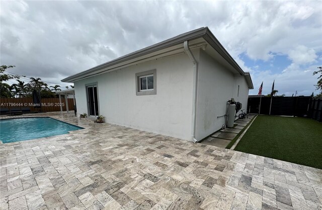 1245 SW 85th Ave, Miami, FL 33144 - view of pool featuring a patio area and a fenced backyard