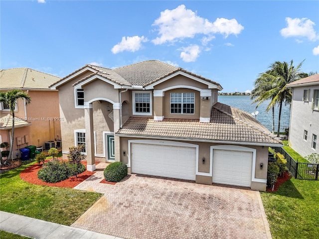 17739 SW 54th St, Miramar, FL 33029 - traditional home with a tiled roof, decorative driveway, stucco siding, and fence