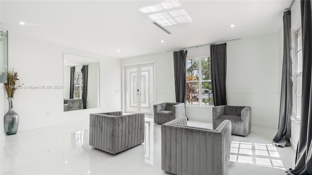 17739 SW 54th St, Miramar, FL 33029 - living room with marble finish floor, visible vents, french doors, and recessed lighting