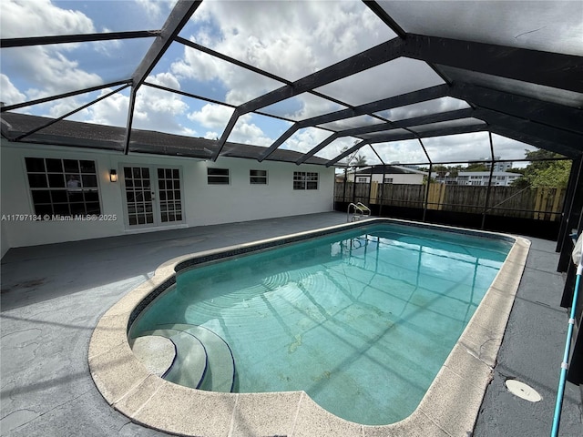 20570 NW 1st Ct, Miami Gardens, FL 33169 - view of pool featuring french doors, a patio area, fence, and a lanai