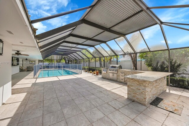 15920 SW 81st Ave, Palmetto Bay, FL 33157 - view of swimming pool featuring area for grilling, grilling area, a patio area, a fenced backyard, and a lanai