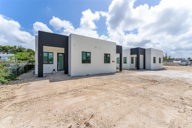 12330 SW 219th St Unit 12330, Miami, FL 33170 - back of house with fence and stucco siding