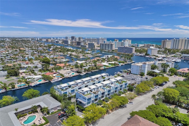 aerial view with a city view and a water view