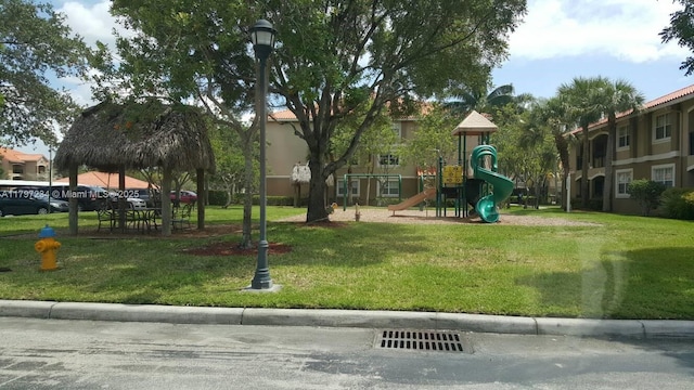 community play area with a yard