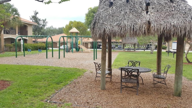 community playground featuring a yard