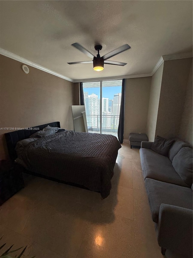 bedroom with crown molding, ceiling fan, and a textured ceiling