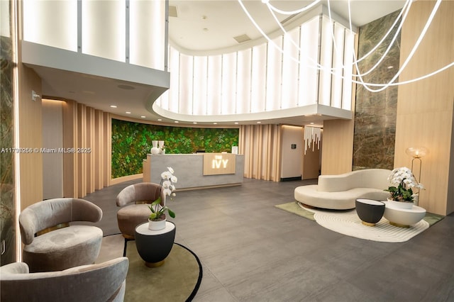 common area with a high ceiling