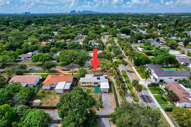 birds eye view of property with a residential view