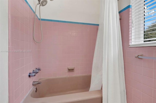 bathroom with shower / bath combo