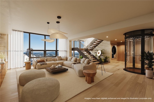 living area featuring expansive windows, light wood-style flooring, arched walkways, and stairs