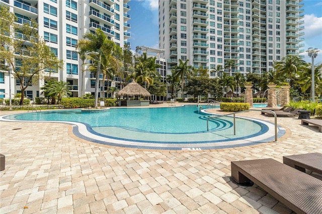 pool featuring a gazebo and a patio
