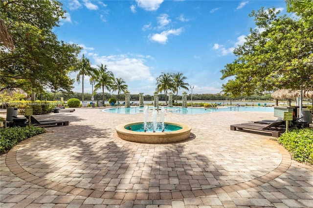 pool featuring a patio area