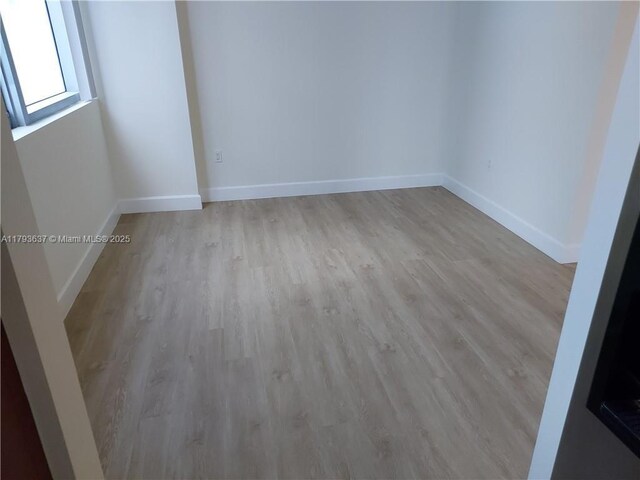 2641 N Flamingo Rd Unit 307N, Sunrise, FL 33323 - spare room with light wood finished floors and baseboards