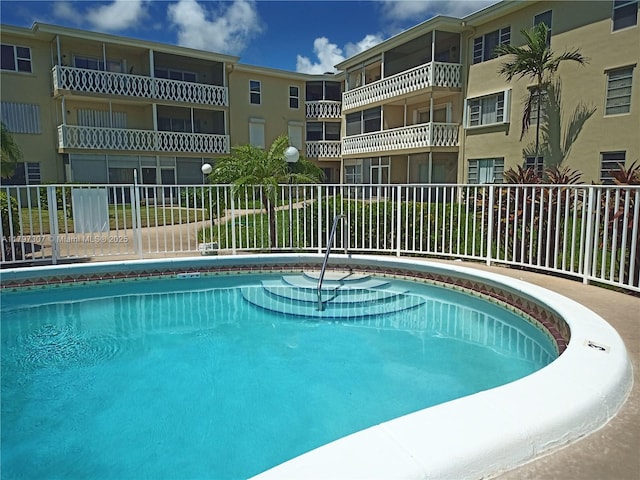pool featuring fence