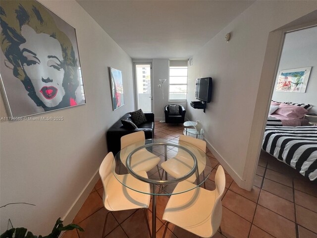 100 Lincoln Rd Unit 1209, Miami Beach, FL 33139 - dining room with light tile patterned floors and baseboards