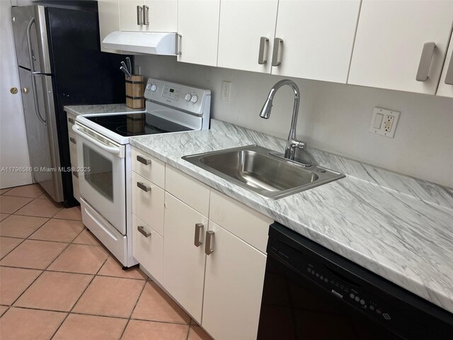 100 Lincoln Rd Unit 1209, Miami Beach, FL 33139 - kitchen featuring light countertops, a sink, under cabinet range hood, dishwasher, and white range with electric stovetop
